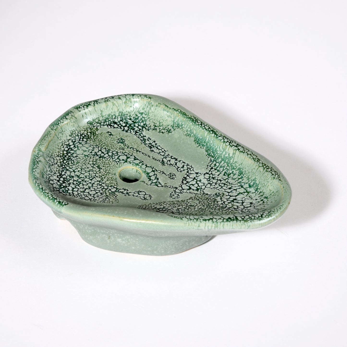 Handmade soap dish with drain hole in a beautiful sea foam glaze