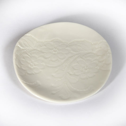 Dainty trinket plate with embossed lace detailing