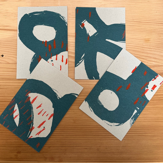 Pack of 4 hand printed notecards (postcard size) locally designed and printed in Cumbria- graphic, bold and modern- lovely to send or to look at and admire!!  2 colourways: TEAL & AMBER.