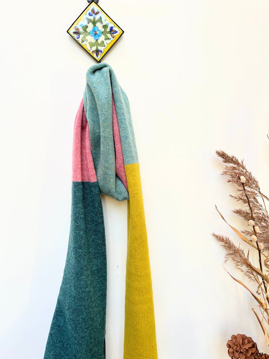 So what could be better than to be wrapped up a statement scarf in beautifully soft lambswool? There are four blocks of colour within the scarf making it unique, stylish and extremely wearable.Designed and made in Cumbria.