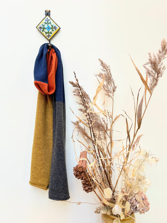 what could be better than to be wrapped up a statement scarf in beautifully soft lambswool? There are four blocks of colour within the scarf making it unique, stylish and extremely wearable.Designed and made in Cumbria.