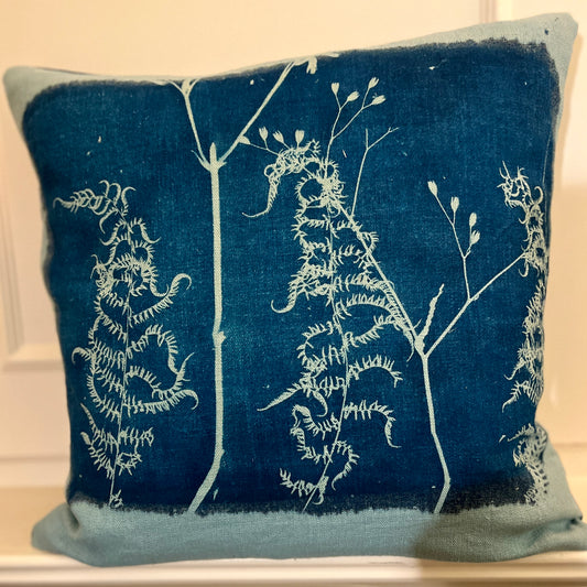 <p>A unique handmade cushion featuring original cyanotype print. Each cyanotype piece is made individually by me so every one is an original.</p> <p>The cushion is in aqua linen.</p>