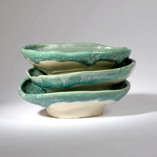 Handmade bowl in a beautiful cool green glaze.