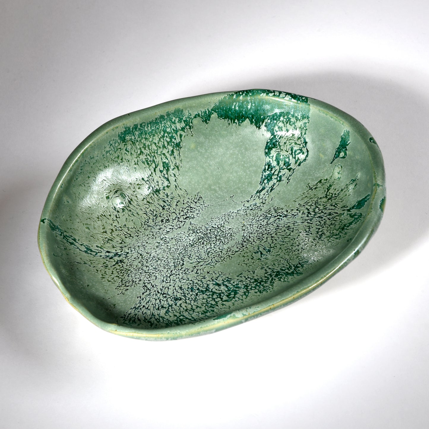 Handmade bowl in a beautiful cool green glaze.