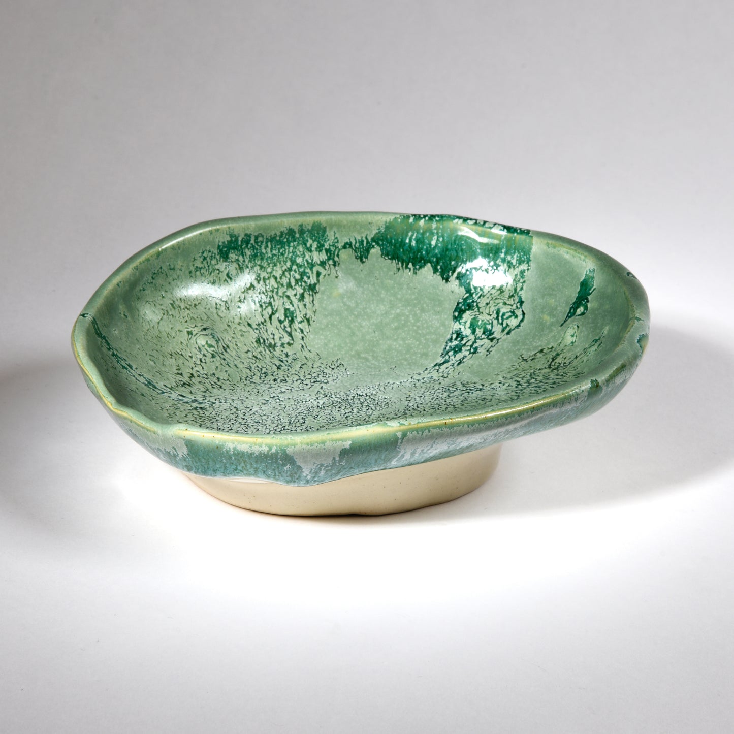 Handmade bowl in a beautiful cool green glaze.