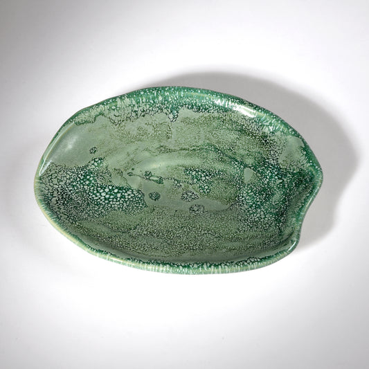 Handmade plate in a beautiful sea foam glaze.